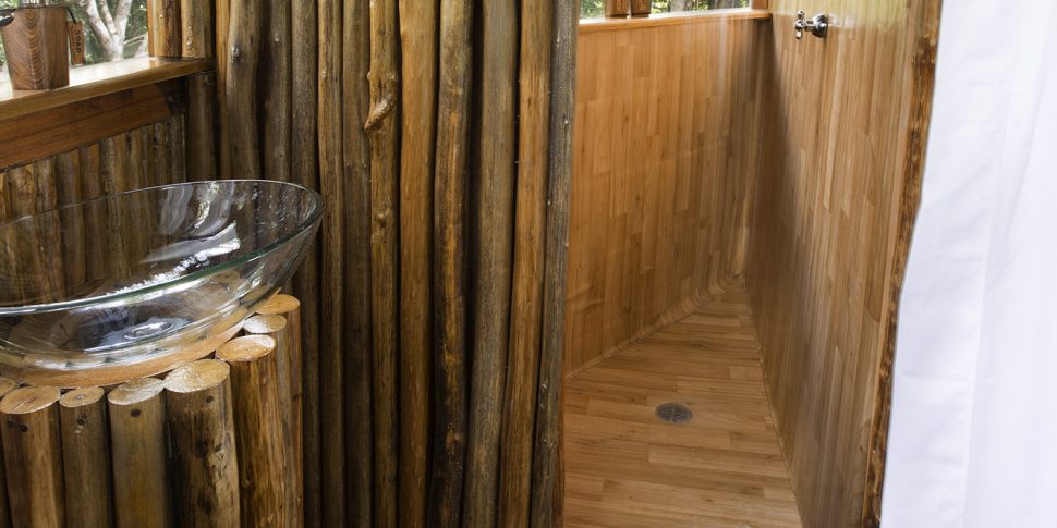 Bathroom and shower space of treehouse at the treehouse lodge in peru.