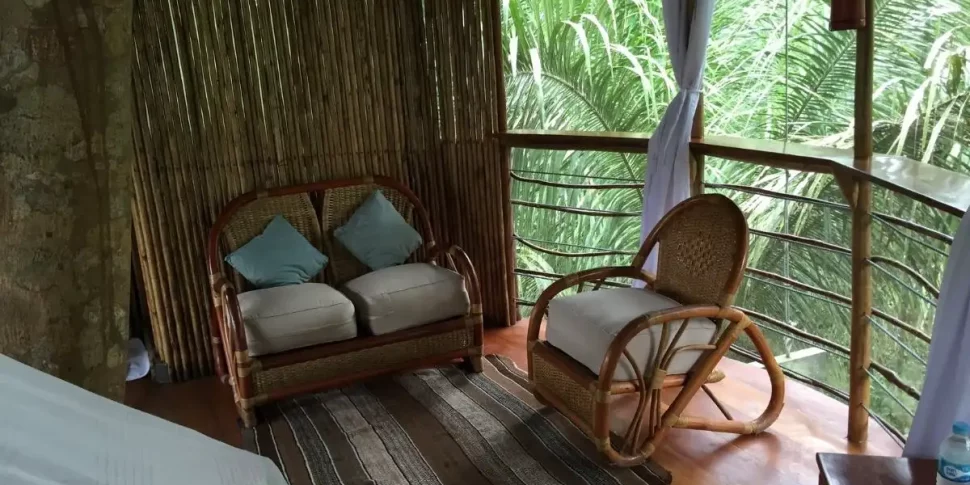Small seating area in rio vista treehouse at the treehouse lodge in peru.
