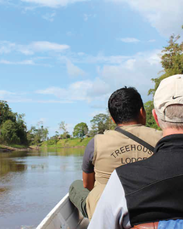 treehouse_lodge_guest_on_boat_tour